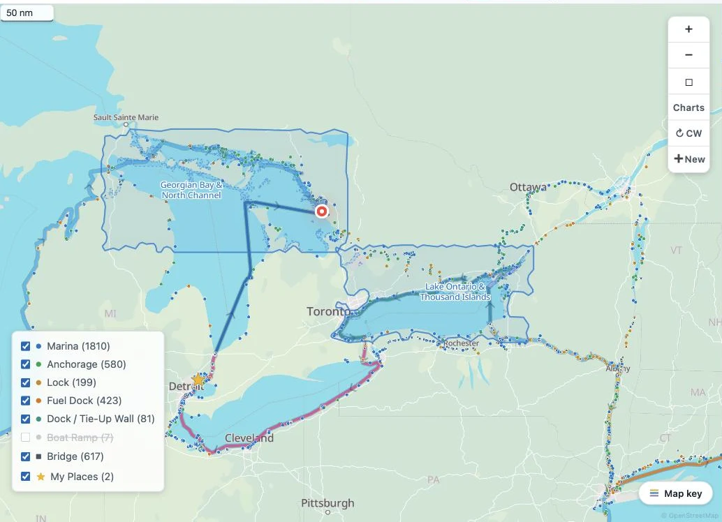The planner's Routing coverage overlay showing both covered regions — Georgian Bay & North Channel and Lake Ontario & Thousand Islands — with a boat cruising inside the Georgian Bay shape.
