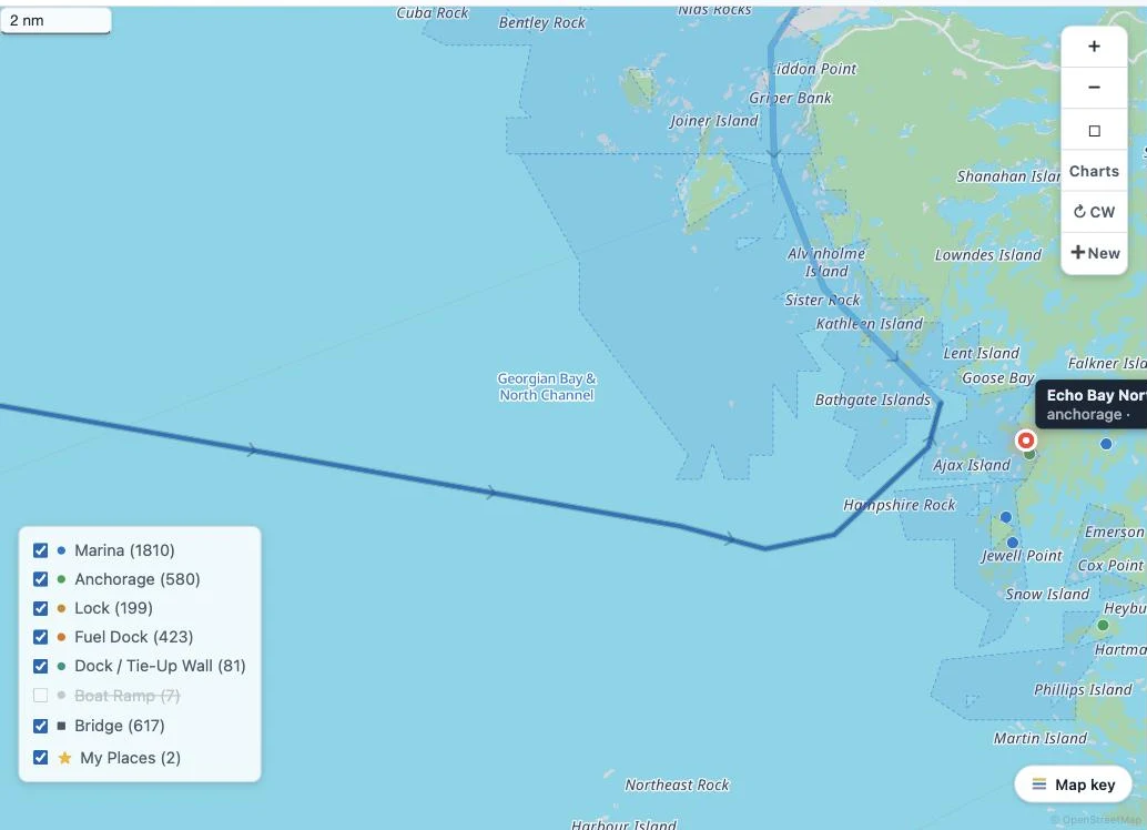 The planner zoomed into eastern Georgian Bay: island, rock and bay names labeled on the water, the day's route line, and the last logged stop at Echo Bay North Anchorage.